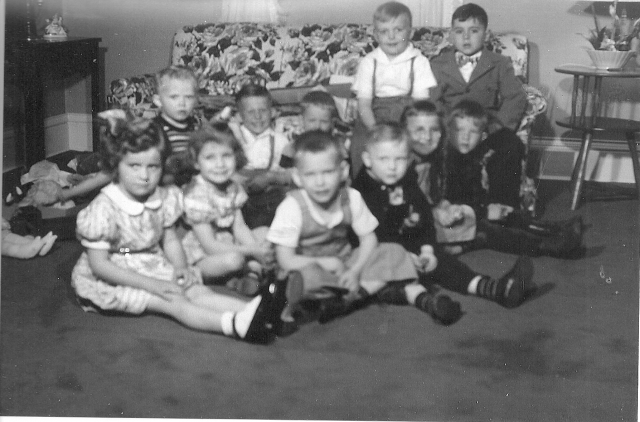 Bobby Stohls early birthday party, guessing 1948?
front row:  Linda Jorgensen, Karen Sue Stenback, ? , Lee Norgard, Ray Sveen, ?
Back Row:  ?, Bobby Stohl, ?, ?, Jim Jorgensen